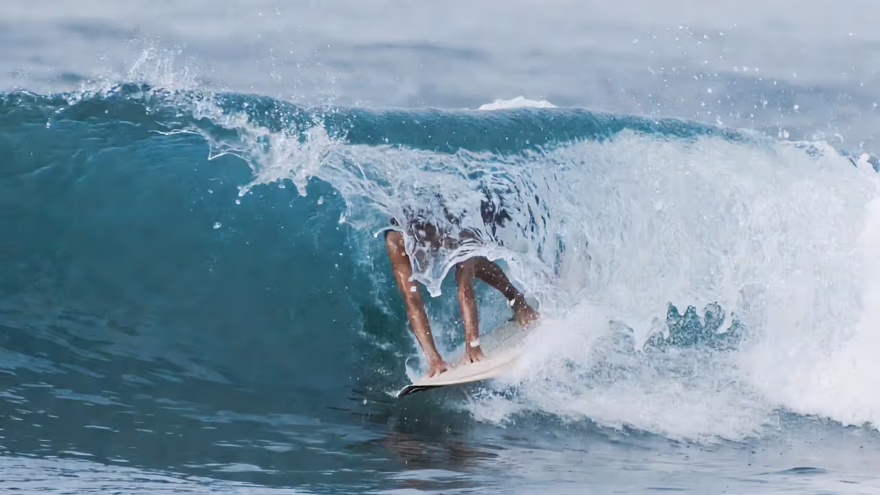 The push-down phase drives the board beneath the wave